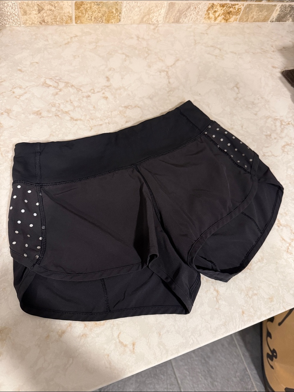 Lululemon Black Athletic Shorts with Silver Polka Dot Panels